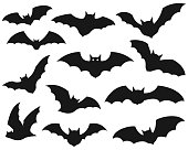 Black silhouettes of bats. vector icon illustration