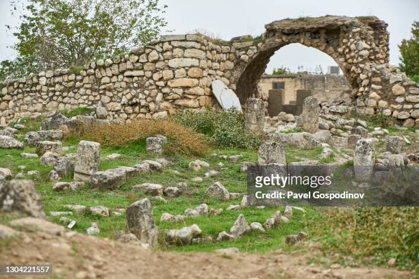an old cemetery in the ancient town of hasankeyf in southeastern anatolia in turkey - the batman stock pictures, royalty-free photos & images