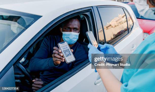 travelling with certificate of covid-19 vaccination - car studio shot stock pictures, royalty-free photos & images