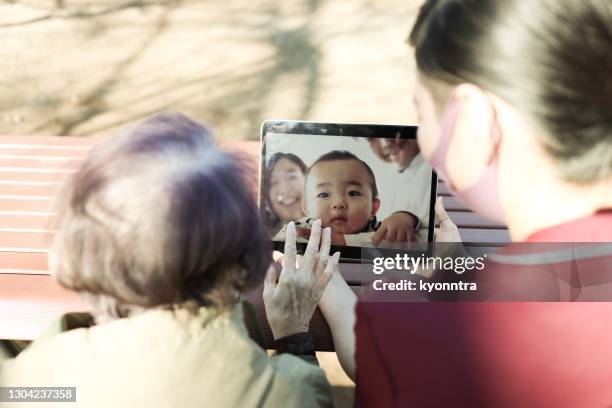 online family communication at hospital - state of emergency stock pictures, royalty-free photos & images