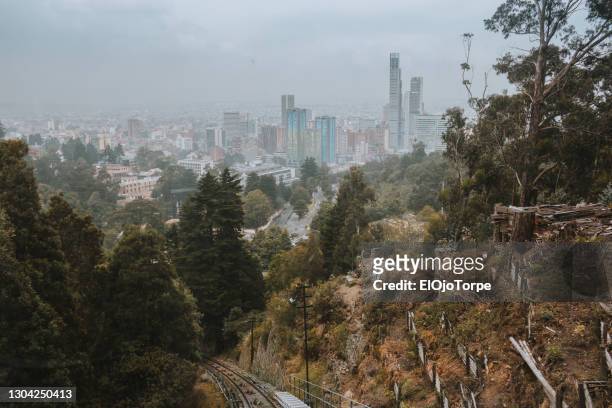 high angle view of bogota city, cable car transportation, colombia - monserrate bogota stock pictures, royalty-free photos & images