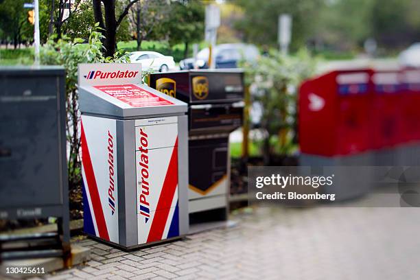 Purolator Courier Ltd. Drop box in this photo taken with a tilt shift lens in Toronto, Ontario, Canada, on Thursday, Oct. 20, 2011. Purolator Courier...