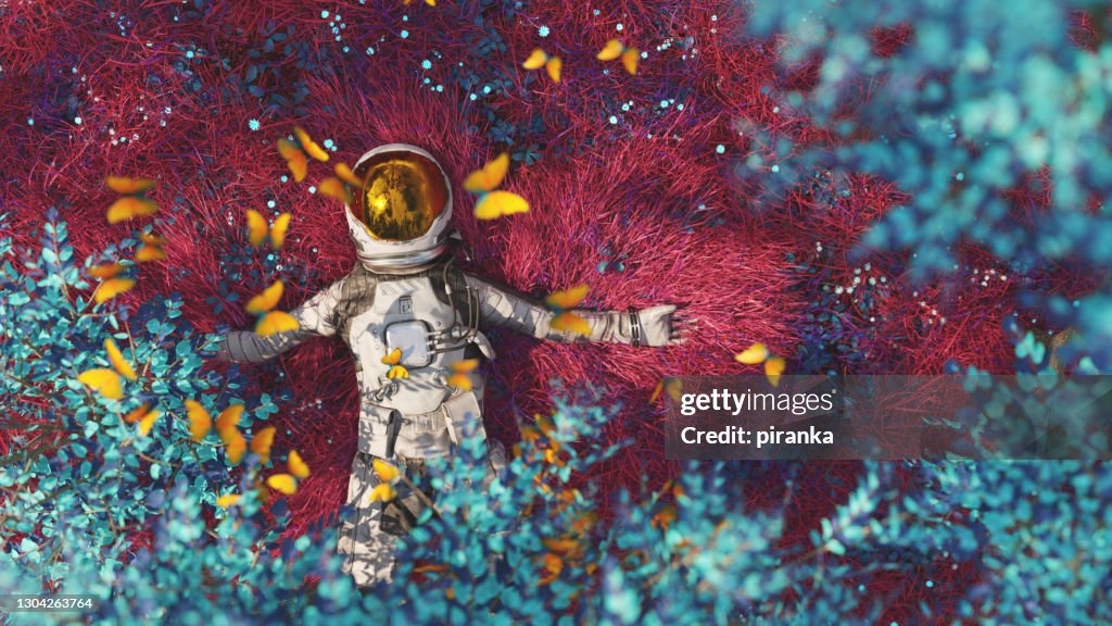 Astronaut resting on an alien planet