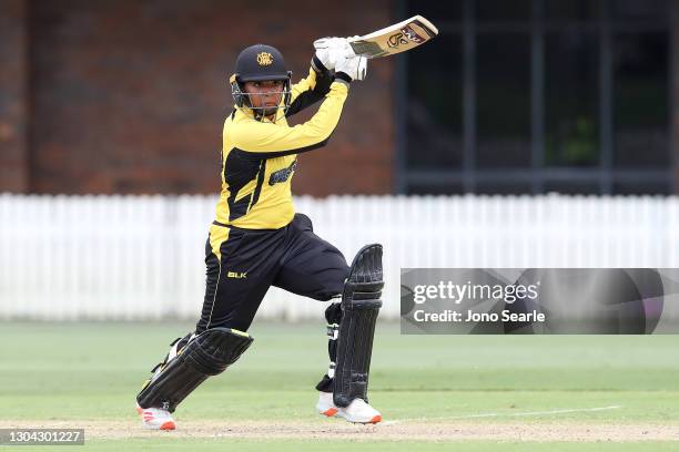 Alana King of WA plays a shot during the WNCL match between Queensland and Western Australia at Allan Border Field on February 27, 2021 in Brisbane,...