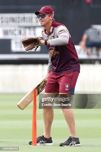 Fire coach Ashley Noffke looks on during the WNCL match between Queensland and Western Australia at Allan Border Field on February 27, 2021 in...