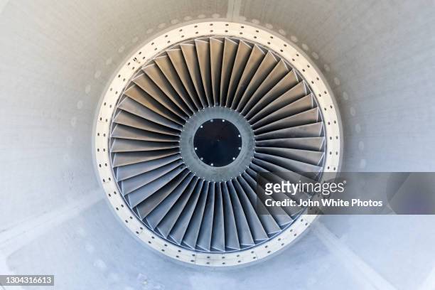 a jet engine turbine. - close up imagens e fotografias de stock