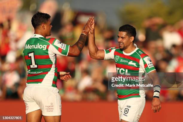 Cody Walker of the Rabbitohs celebrates scoring a try with Latrell Mitchell of the Rabbitohs during the Charity Shield & NRL Trial Match between the...