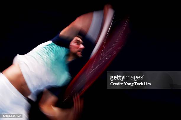 Marin Cilic of Croatia serves in his Men's Singles Semifinal match against Alexei Popyrin of Australia on day six of the Singapore Tennis Open at the...