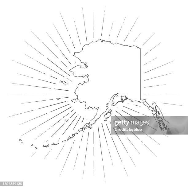 alaska map with sunbeams on white background - alaska us state stock illustrations