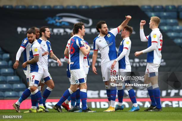 Ben Brereton of Blackburn Rovers celebrates with teammates after scoring his team's first goal during the Sky Bet Championship match between...