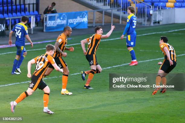 Reece Burke of Hull City celebrates scoring his teams second goal during the Sky Bet League One match between AFC Wimbledon and Hull City at Plough...