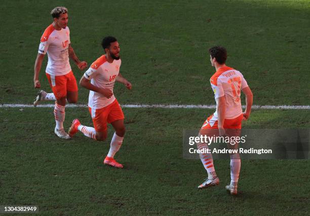 Matty Virtue of Blackpool celebrates with teammates after scoring his side's second goal during the Sky Bet League One match between Charlton...