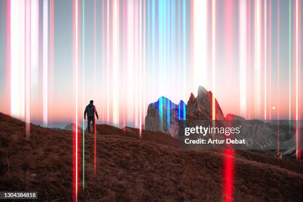 colorful lights emerging from the italian alps, global 5g connections. - geld technisch mensch stock-fotos und bilder