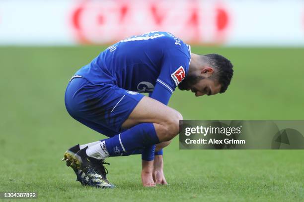 Nabil Bentaleb of FC Schalke 04 looks dejected during the Bundesliga match between VfB Stuttgart and FC Schalke 04 at Mercedes-Benz Arena on February...