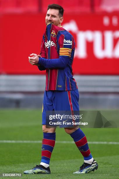 Lionel Messi of FC Barcelona reacts during the La Liga Santander match between Sevilla FC and FC Barcelona at Estadio Ramon Sanchez Pizjuan on...