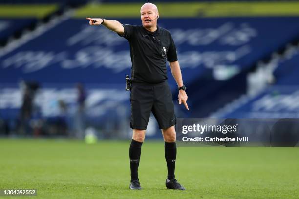 Referee Lee Mason gives instructions during the Premier League match between West Bromwich Albion and Brighton & Hove Albion at The Hawthorns on...