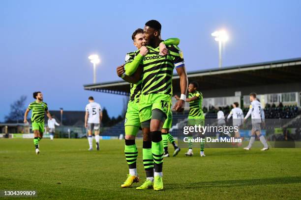 Jamille Matt of Forest Green Rovers celebrates with teammate Nicky Cadden after scoring his team's first goal during the Sky Bet League Two match...