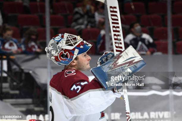 Hunter Miska of the Colorado Avalanche looks up ice during a stop in play against the Arizona Coyotes at Gila River Arena on February 26, 2021 in...