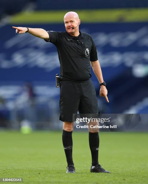 Referee Lee Mason during the Premier League match between West Bromwich Albion and Brighton & Hove Albion at The Hawthorns on February 27, 2021 in...