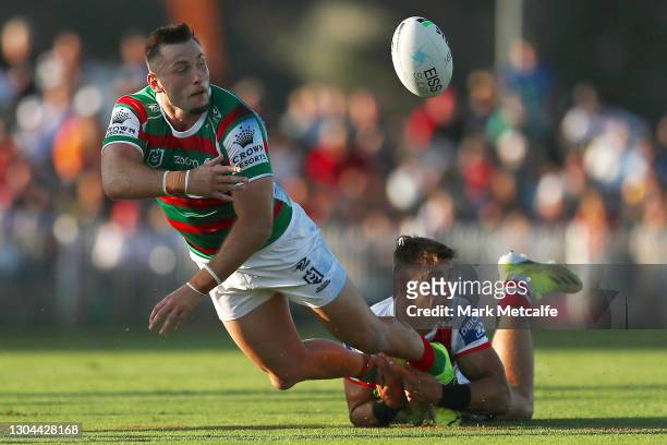 Jacob Host of the Rabbitohs offloads during the Charity Shield & NRL Trial Match between the South Sydney Rabbitohs and the St George Illawarra...