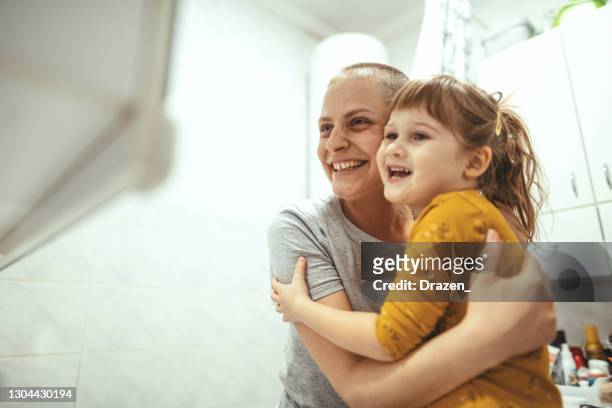raising family as single mother with cancer - cancer patient with family stock pictures, royalty-free photos & images