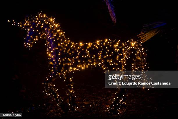 unicorn figure with neons - unicorn stock pictures, royalty-free photos & images