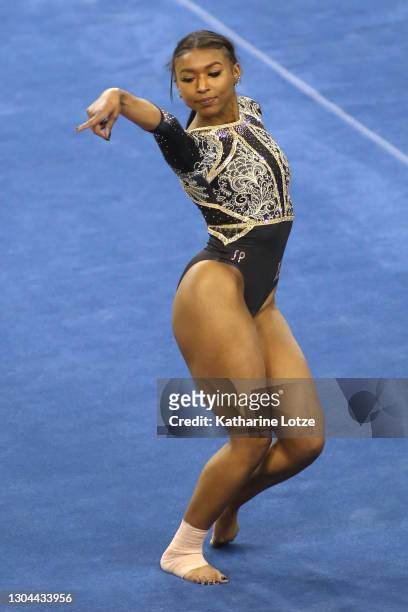 Nia Dennis of the UCLA Bruins competes on floor exercise during a meet against the Oregon State Beavers at Pauley Pavilion on February 27, 2021 in...