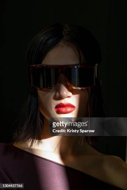 Model poses backstage before the Sportmax Fashion show during the Milan Women's Fashion Week Fall/Winter 2021/2022 on February 27, 2021 in Milan,...