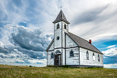 Dramatic sky over Peace Lutheran Church in Stonehenge, SK