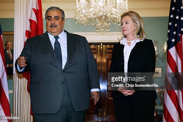 Bahraini Foreign Minister Shaikh Khalid bin Ahmed al-Khalifa and U.S. Secretary of State Hillary Clinton leave make brief remarks to the press in the...