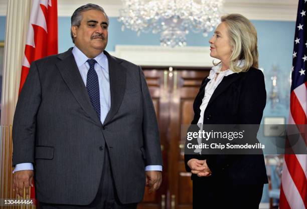 Bahraini Foreign Minister Shaikh Khalid bin Ahmed al-Khalifa and U.S. Secretary of State Hillary Clinton make brief remarks to the press in the...