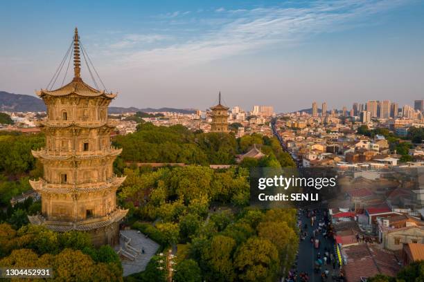 aerial view of kaiyuan temple and west street at dusk in quanzhou, china - quanzhou stock pictures, royalty-free photos & images