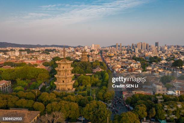 aerial view of kaiyuan temple and west street at dusk in quanzhou, china - quanzhou stock pictures, royalty-free photos & images