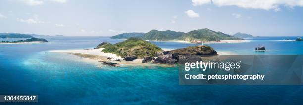 pristine island beach and ocean. zamami island from above - list of islands by highest point stock pictures, royalty-free photos & images