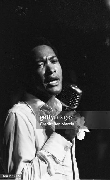 Sam Cooke , singer, songwriter and civil-rights activist, on stage with band at New York's Copacabana nightclub, June 1964.