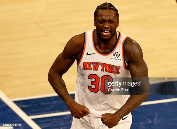 Julius Randle of the New York Knicks celebrates after drawing the foul late in the fourth quarter against the Indiana Pacers at Madison Square Garden...
