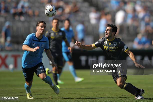 Benat Etxebarria of the Bulls competes for the ball against Alexander Baumjohann of Sydney FC during the A-League match between Sydney FC and...