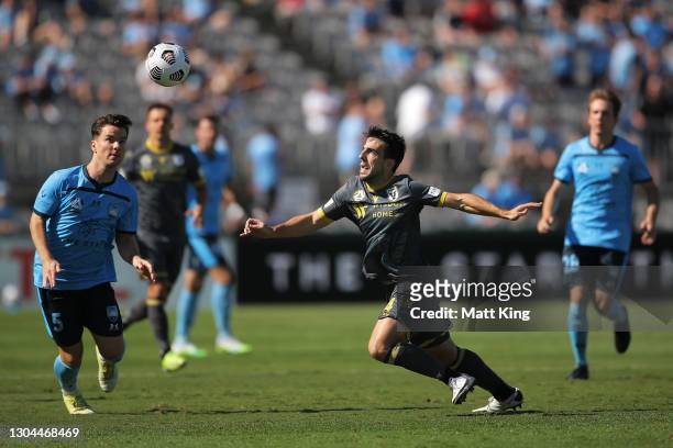 Benat Etxebarria of the Bulls competes for the ball against Alexander Baumjohann of Sydney FC during the A-League match between Sydney FC and...