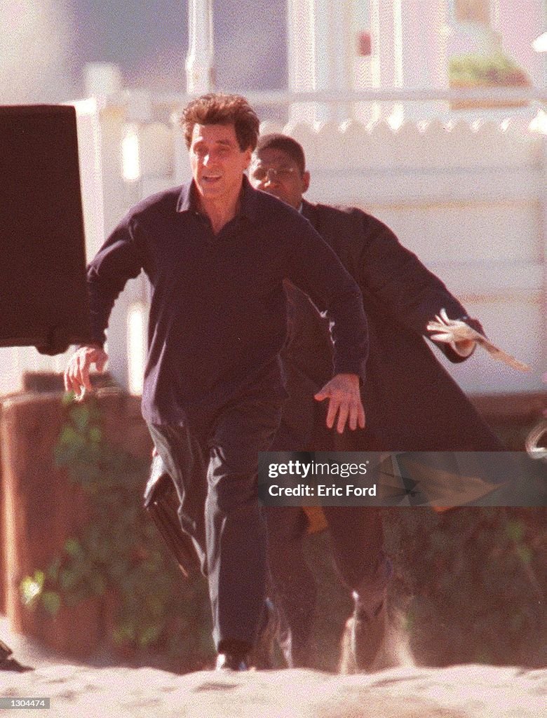 Actor Al Pacino prepares to film a scene on the set of "Simone" on
