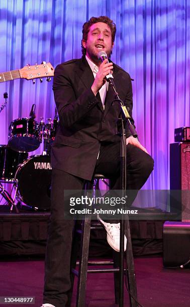 Singer Elliott Yamin performs at the 11th Annual Uniting Nations Awards viewing and dinner after party at The Beverly Hilton hotel on March 7, 2010...