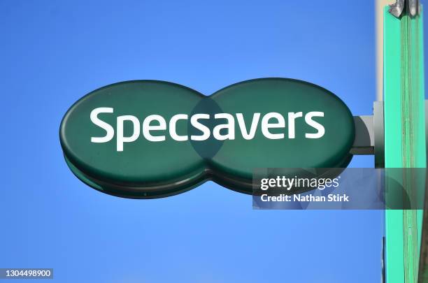 Specsavers sign is seen outside its store on February 27, 2021 in Barnsley, England .