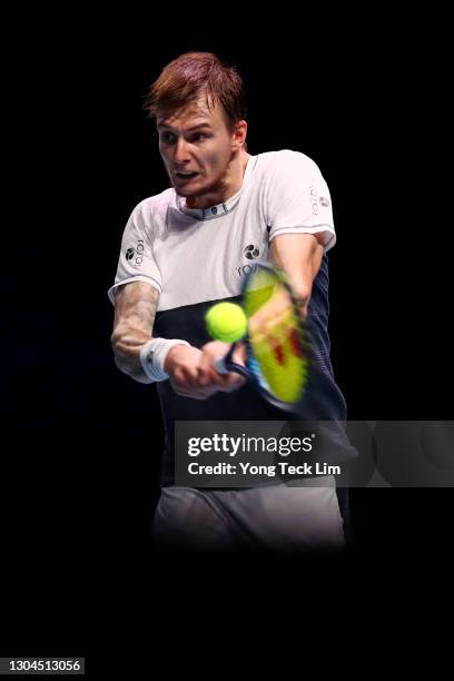 Alexander Bublik of Kazakhstan plays a backhand in his Men's Singles Final match against Alexei Popyrin of Australia on day seven of the Singapore...
