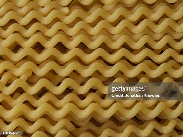 fusilli lunghi pasta - length stock pictures, royalty-free photos & images