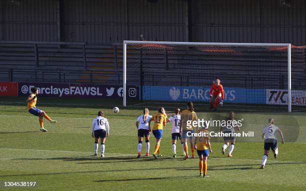 Valerie Gauvin of Everton scores their side's first goal from the penalty spot past Aurora Milkalsen of Tottenham Hotspur during the Barclays FA...