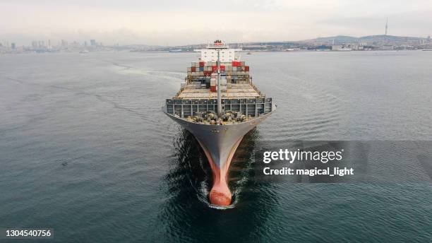 aerial view of freight ship with cargo containers. - port of hamburg stock pictures, royalty-free photos & images