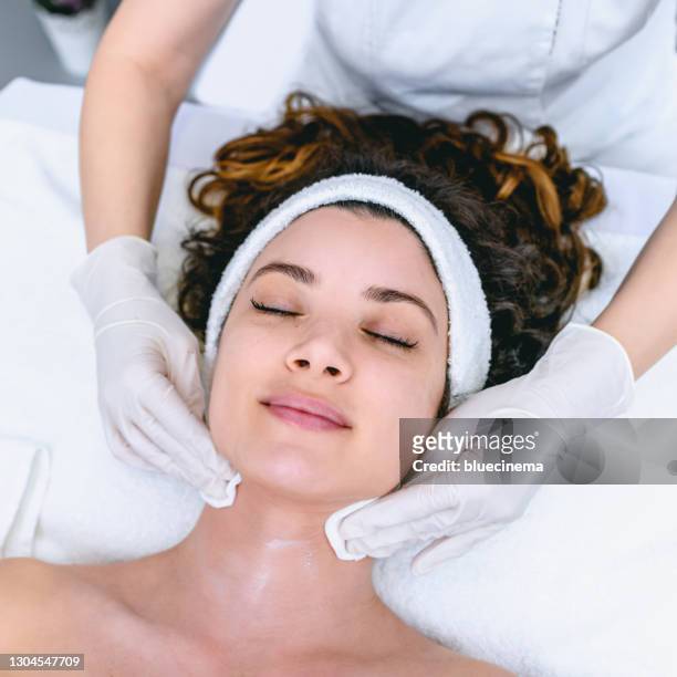 facial exfoliation - cotton pad stock pictures, royalty-free photos & images