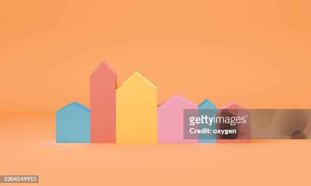 3d rendering small colorful houses icon on yellow baackground - three dimensional house stock pictures, royalty-free photos & images