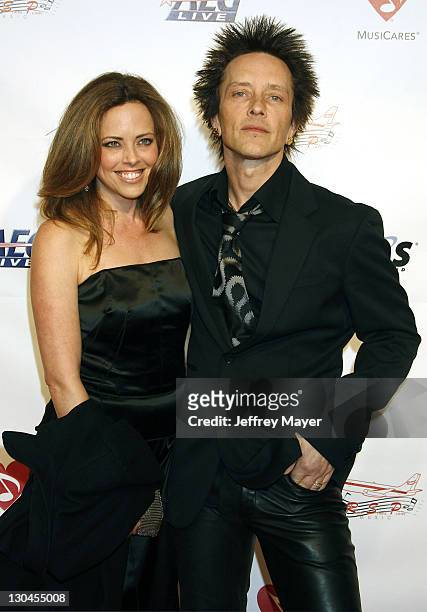 Musician Billy Morrison and guest arrive at the 2009 MusiCares "Person Of The Year" Gala at the Los Angeles Convention Center on February 6, 2009 in...