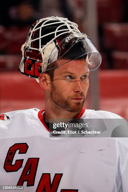 Goaltender James Reimer of the Carolina Hurricanes skates back to the net after a break in the action against the Florida Panthers at the BB&T Center...