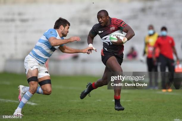 Willy Ambaka of Kenya is tackled by Santiago Álvarez of Argentina during the mens finals between Argentina and Kenya during the Madrid Rugby Sevens...